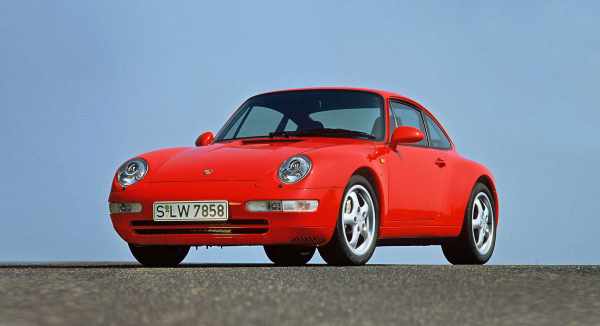 A red Porsche 993 seen from the front