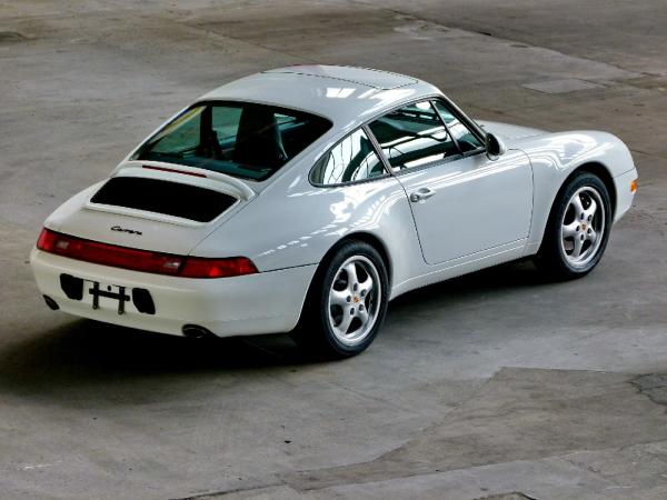 White 1995 911 Carrera 2, seen from the rear